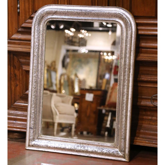 Circa 1870, this elegant French wall mirror reflects the restrained refinement of the Louis Philippe period. The...