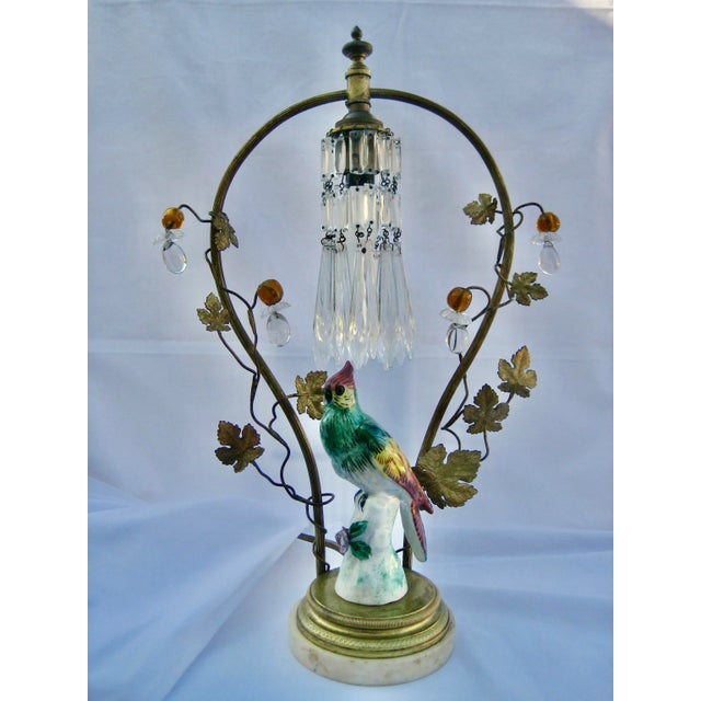 This is truly a very lovely accent lamp with a charming designed and used of lots of different materials that makes it...
