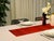 The scarlet horizon. The graduated dye that holds three temperatures of red in one cloth — scarlet, vermilion, and the...