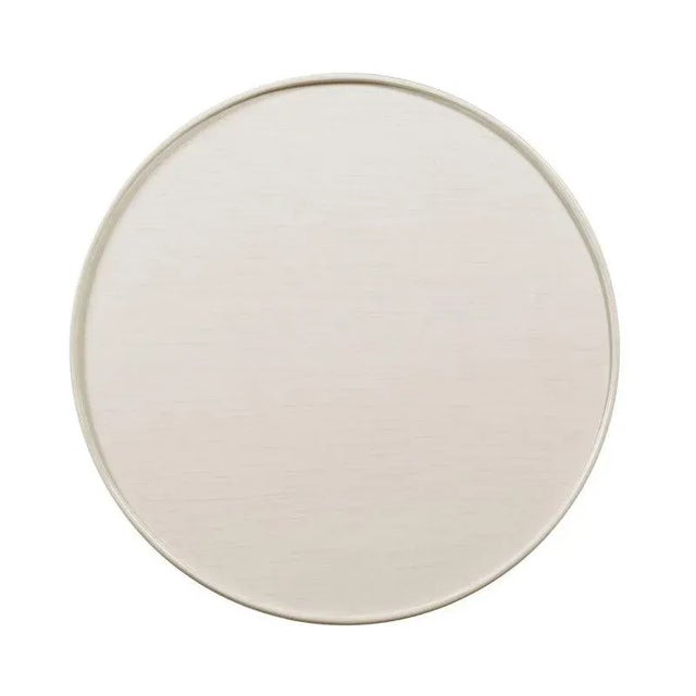 A round molded top is placed over circular apron rails that are fitted with a handy drawer, elevated by four curvaceous...