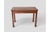 This charming rustic table is a perfect example of simplicity and functionality, crafted entirely from solid wood with an...