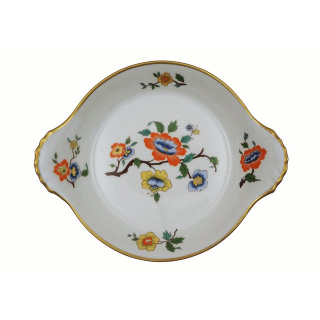 A stunning set of twelve shallow French au gratin dishes, expertly crafted from Porcelaine à Feu in France. Each piece...