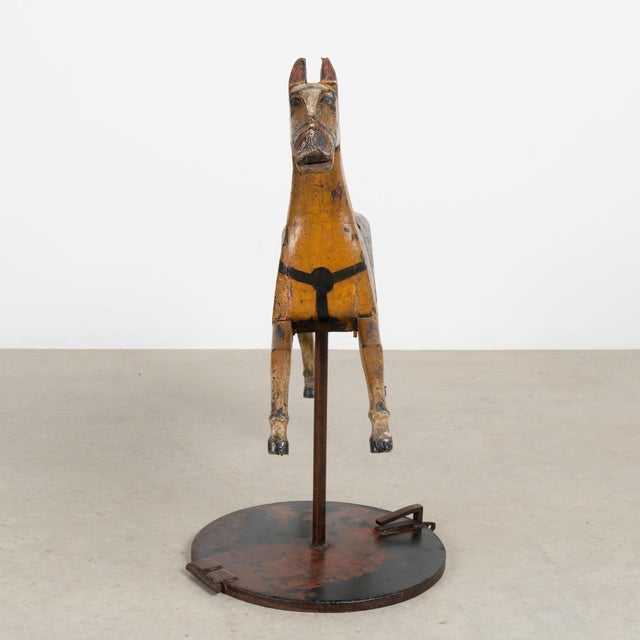 Mid 19th century Swedish carousel horse, hand carved in pine with a heavily distressed original painted finish. Painted...