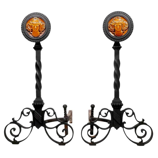 Incredible Aesthetic Movement andirons, having a cast and wrought iron structure, with J.and J.G. Low Art Tile Works tiles...