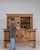 Here is a side cabinet, its natural honey oak, 2 doors, black iron strap hinges the first thing to catch the eye. It was...