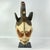 A wonderful Igbo Maiden Spirit Mask from Nigeria, adorned with white pigment. Reflecting typical facial features found on...