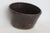 his Salt Crock is made out of ceramic. This lovely handmade pottery bowl features a rounded shape with a lovely folk style...