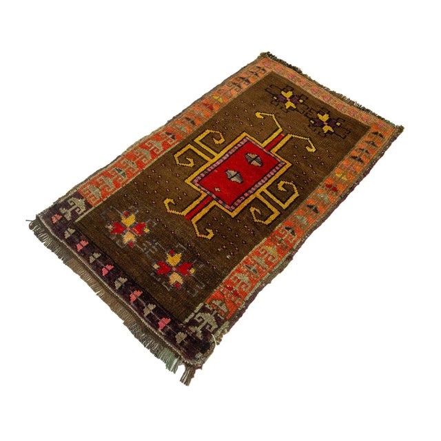 Vintage Handknotted decorative mini rug from Kars region of Turkey. Approximately 45-55 years old. In very good condition.