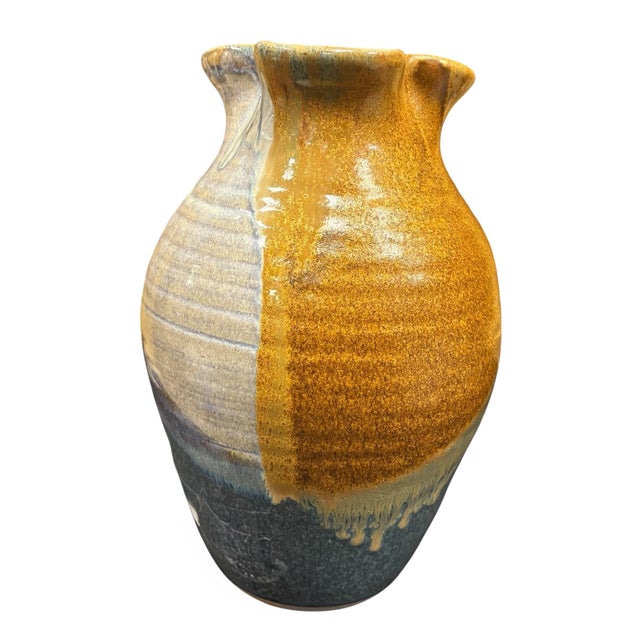 Beautiful handcrafted pottery pitcher by Mark Chrisco, showcasing the rich artistry and tradition of North Carolina studio...