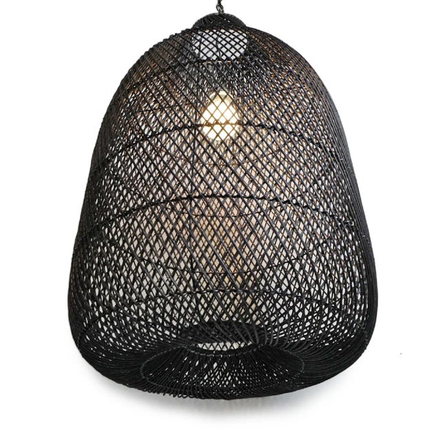 Beautiful black wicker bottle shaped pendant lantern. Open bottom for direct downward light makes this a great choice for...