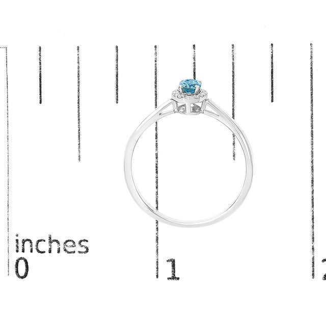 Metal 10K White Gold 5X3MM Oval Blue Topaz and Diamond Accent Halo Ring (I-J Color, I1-I2 Clarity) - Ring Size 5.5 For Sale - Image 7 of 7