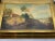 Mid century Venetian oil painting on canvas with a striking gold gift wood frame. Landscape depicted near a bed of water....