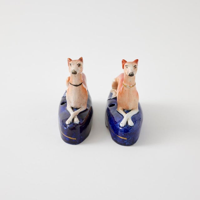 - Created in Staffordshire, England in the mid-nineteenth century, this elegant canine pair was designed as a whimsical...