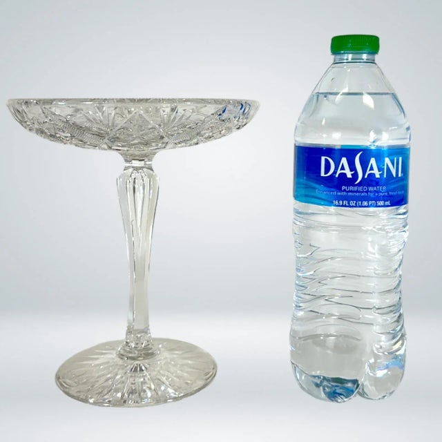 Stylish compote offering an intricate style of American Brilliant Cut (ABC) glass. Age unknown, presumed to be mid 20th...