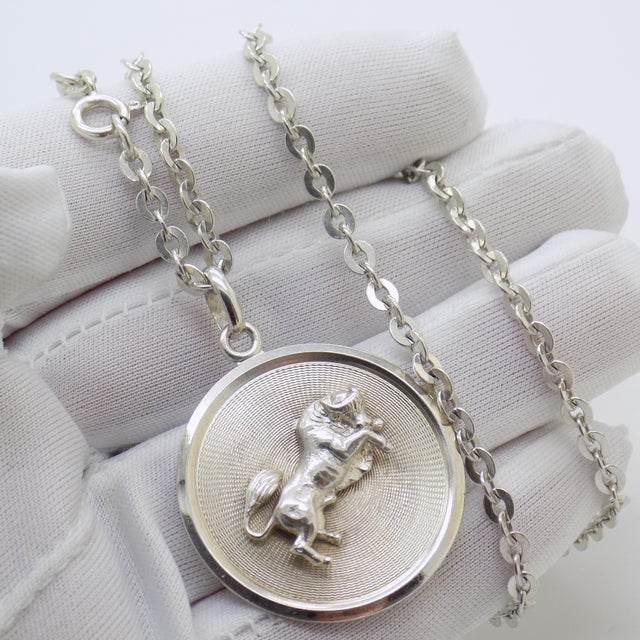 This important vintage medallion depicts the Taurus zodiac sign, handcrafted in Italy during the 1970s/1980s by the...