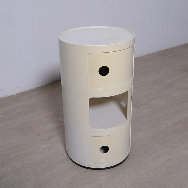 This is a Kartell Componibili unit designed by Anna Castelli Ferreri in the 1960s, recognizable by the brand name...
