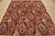 A modern traditional Suzani rug hand-knotted with fine wool on a cotton foundation. This rug features a botanical pattern...