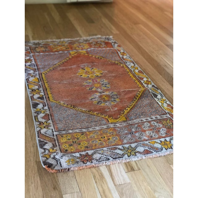 Vintage wool Oushak rug, in good vintage condition, a few spots show wear see photos.