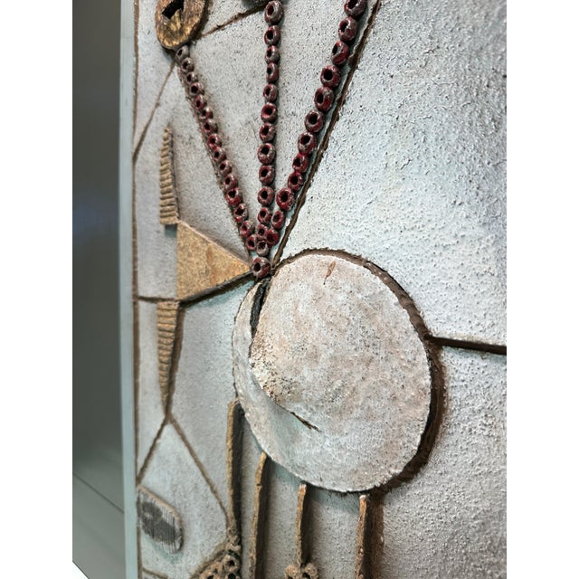 Brutalist ceramic wall sculpture framed in wood and signed THK