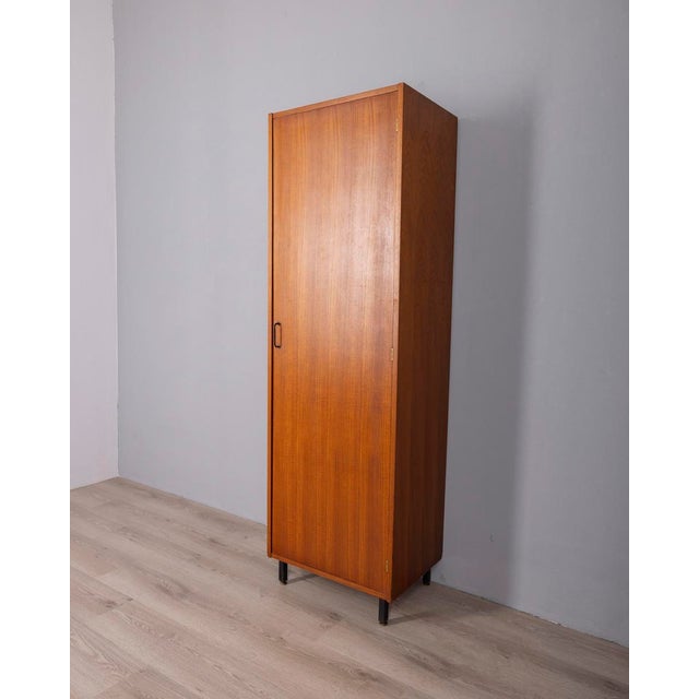 Wooden wardrobe with a hanger rack and two shelves inside, designed by Z.A.M. Milano Italy, 1960s.