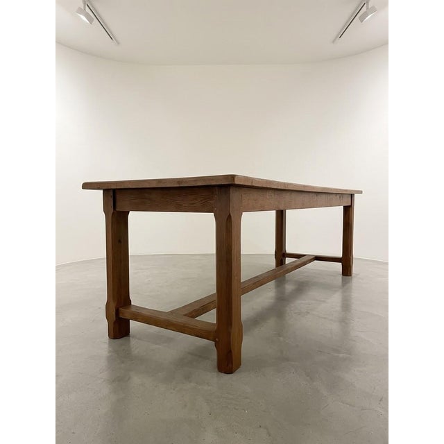 Monumental French Provincial Walnut Farmhouse Dining Table, 1955, in Very Good conditions. Designed before 1890 This piece...