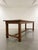 Monumental French Provincial Walnut Farmhouse Dining Table, 1955, in Very Good conditions. Designed before 1890 This piece...