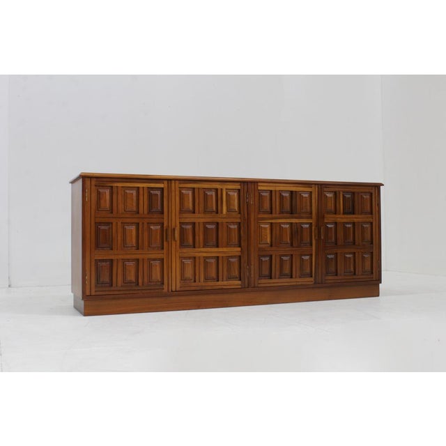 Vintage brutalist wooden sideboard with panelled geometric front. Beautiful piece from the 1970s, Spain. Plenty of storage...