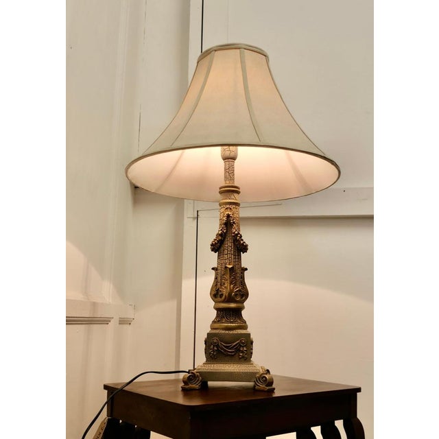 Corinthian Column Table Lamp. This is a very attractive piece the column is decorated with swags and acanthus leaves and...