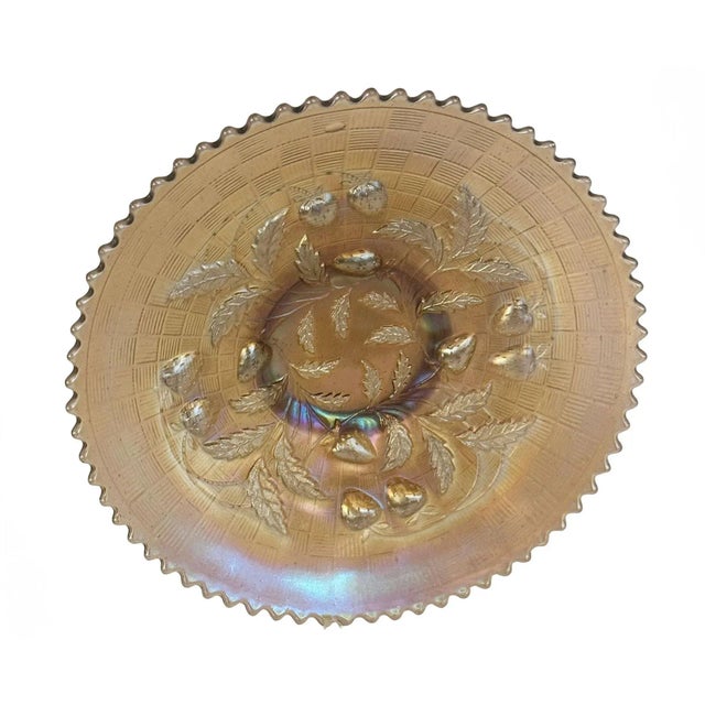 This Northwood Carnival glass strawberry plate is a beautiful and rare color. American, circa 1909.