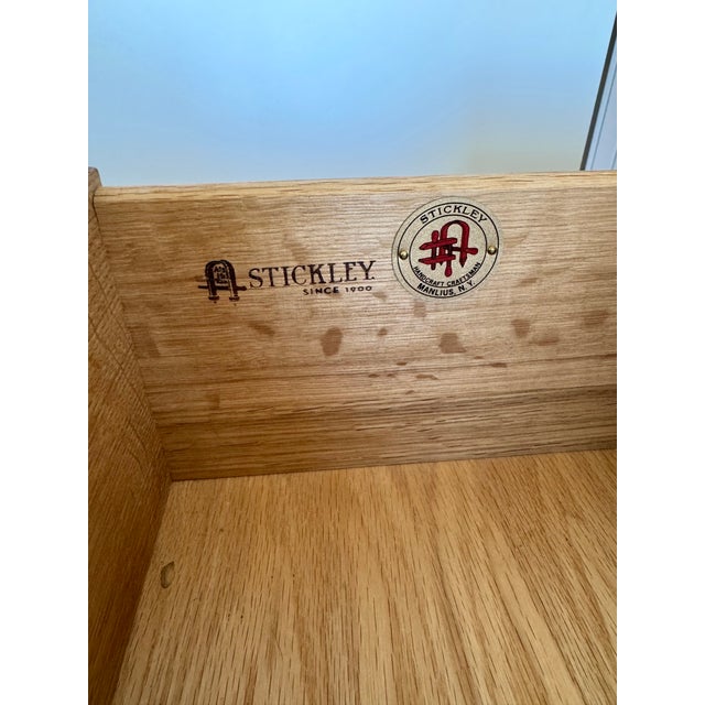 These Stickley Mission Nightstands are crafted from solid oak, showcasing Stickley’s signature Arts & Crafts design and...