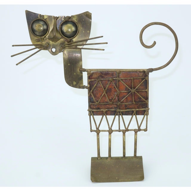 Metallic meows! C.1970 brutalist cat sculpture created in brass and copper by French artist, JARC. Though I was unable to...