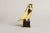 An Art Deco–style animal bronze of an owl, the bird pared down to a single smooth, rounded volume — broad head, large...
