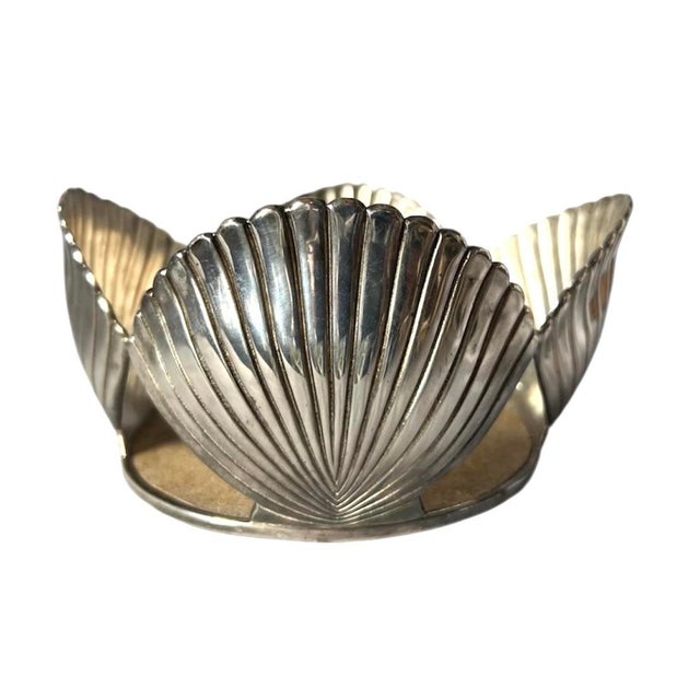 Emilia Castillo Silver Shell wine bottle coaster. Large etched Shells adorn the exterior sides. Interior surface is lined...