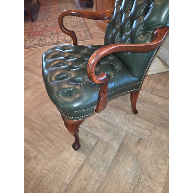 Classic dark green fully tufted leather gooseneck arm chair...great for a desk or library decor.