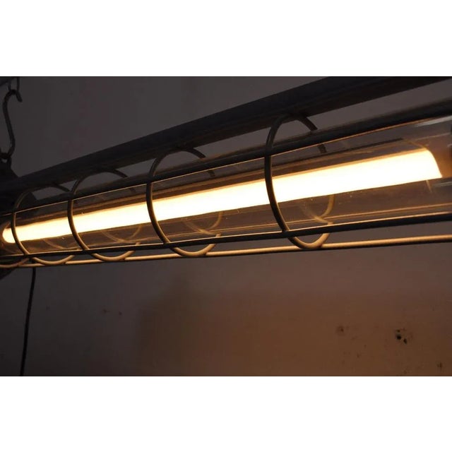 Tough, small size, industrial fluorescent lamps with polycarbonate tube and dimmable LED tube (2700K). The fluorescent...