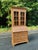 Handsome vintage secretary crafted in warm, richly grained pine. The upper bookcase features two mullioned glass doors...