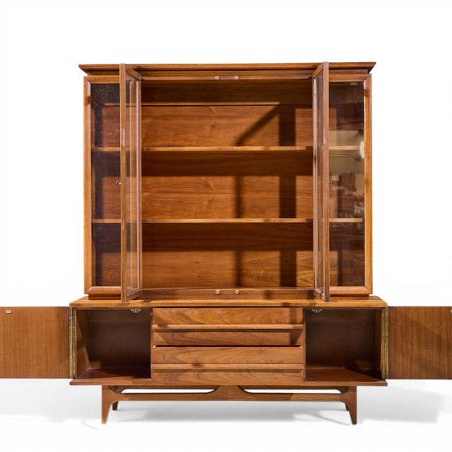 Young Manufacturing Mid Century Credenza and Hutch The credenza measures: 64 wide x 19 deep x 25 inches high The hutch...