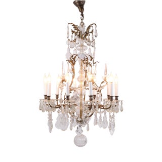 Antique Crystal Chandelier in Gilt Bronze with Louvre Style Decorations, 1920s For Sale
