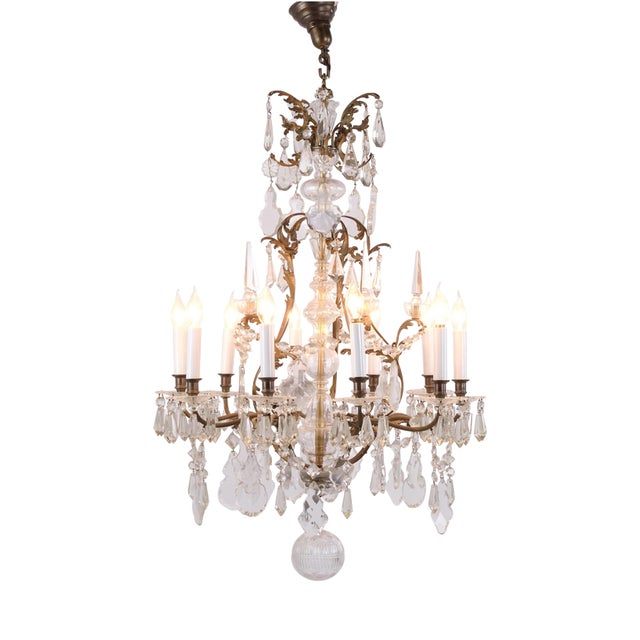 Antique Crystal Chandelier in Gilt Bronze with Louvre Style Decorations, 1920s For Sale