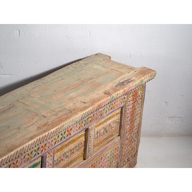 Antique painted sideboard in pine wood, traditional Uyghur furniture with polychrome tracery originating from Xinjiang and...