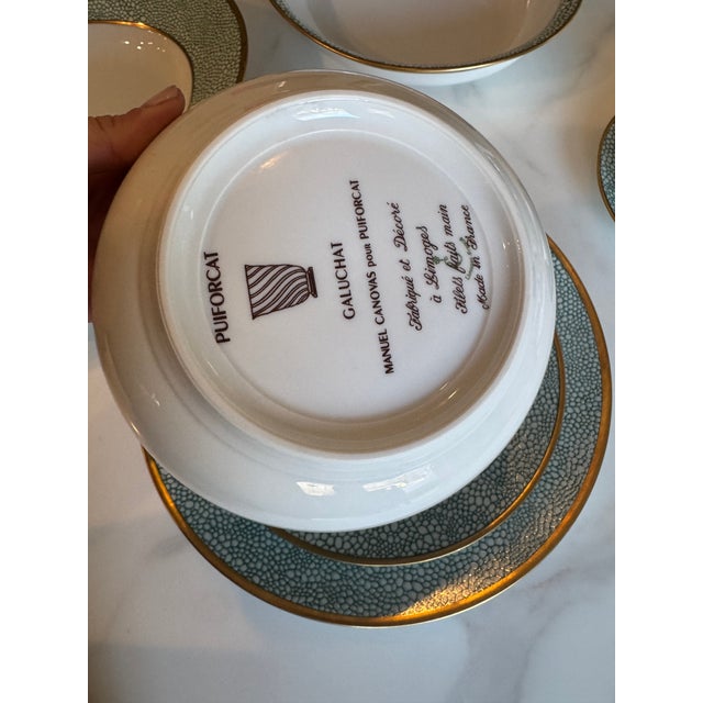 Exceptional and rare French Limoges porcelain dinnerware set by Puiforcat, featuring the elegant “Galuchat” pattern...