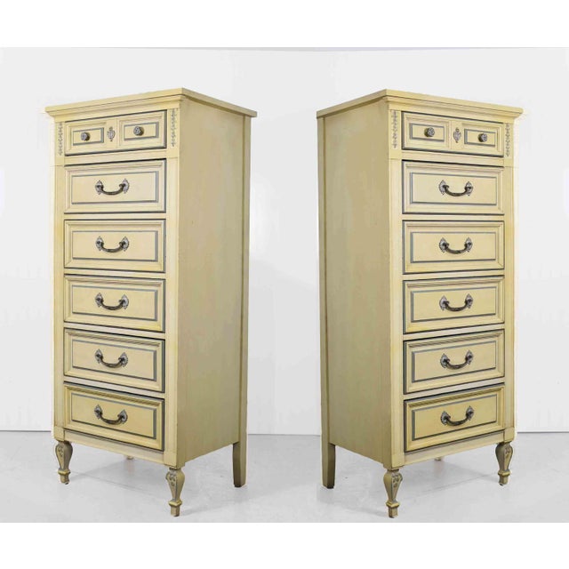 We have a pair of pretty Mid Century French Style Lingerie Chests by Dixie. These solid wood chests of drawers feature 6...