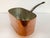 This vintage rectangular copper pot was crafted in France and is built to last. It has a lustrous exterior, an enameled...