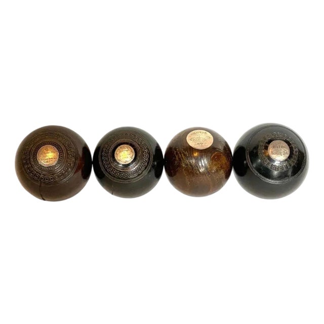 Collection of Four Scottish Thomas Taylor and English Lignum Vitae Lawn Balls For Sale