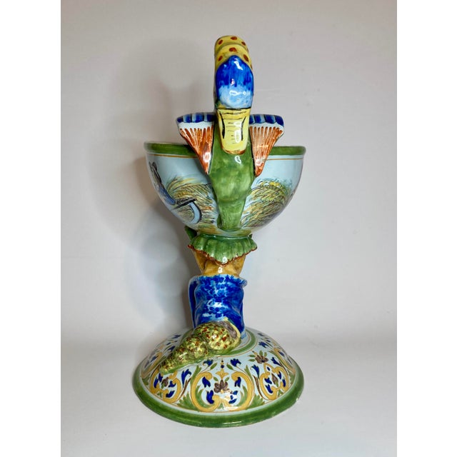 A rare antique French faience Porquier-Beau footed compote with a bowl shaped liked a swan body and a handle shaped like a...