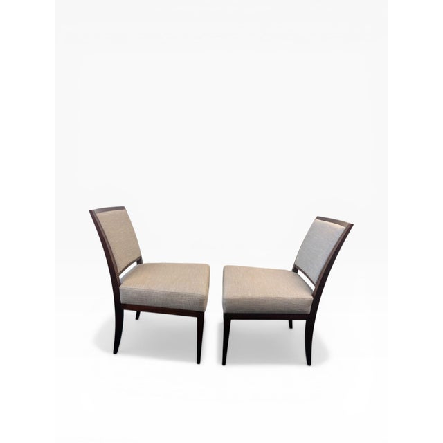 A stylish pair of contemporary dining chairs by Bolier & Company, crafted in warm cherry wood with a clean, tailored...