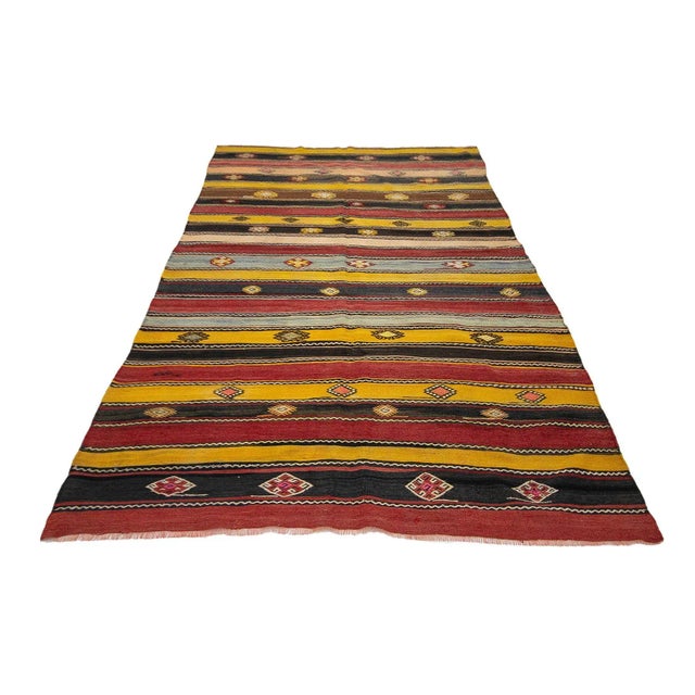 Handwoven vintage kilim rug from Denizli region of Turkey. Approximately 50-60 years old. In very good condition.