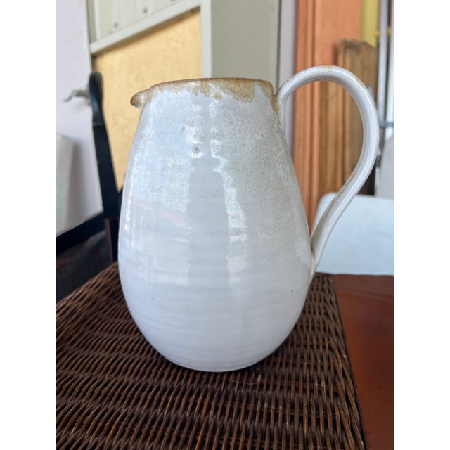 The Vintage Holly Hill Pottery Pitcher from 1993 is a unique and custom piece signed by the artist, making it a highly...
