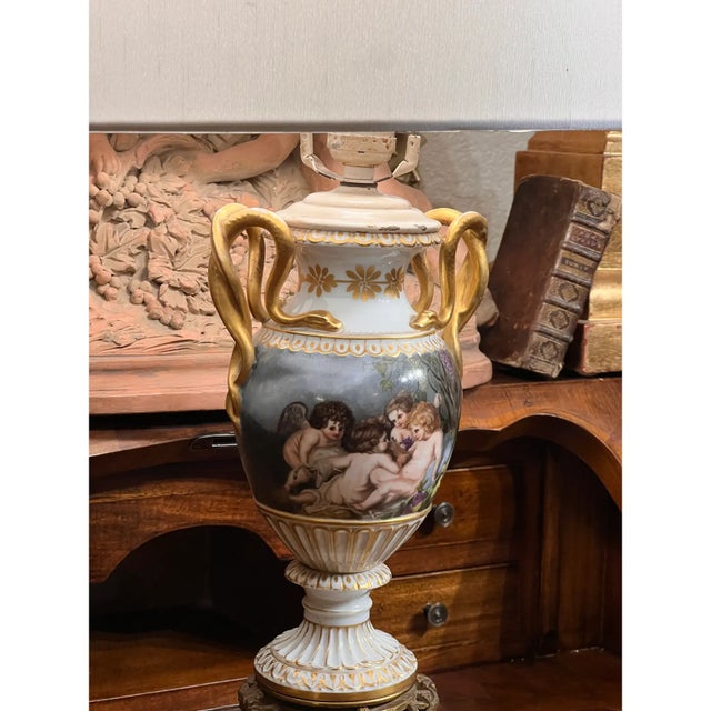 Late 19th century/Early 20th century, french porcelain vase, with intricate details and fine taste, the sides with...