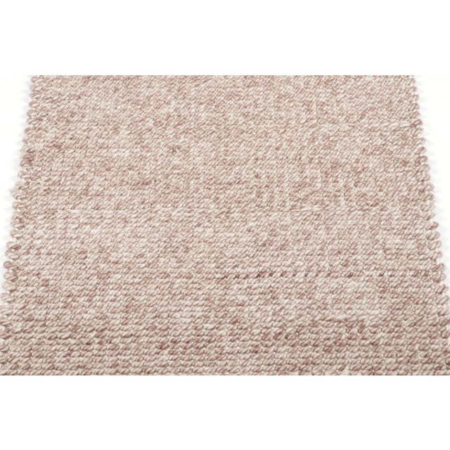 This 2x3 contemporary dhurrie gift-sized rug brings warmth and texture to the floor. Handwoven in wool, its chunky...